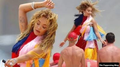 Rita Ora Wears a Bright Dress as She Does a Sexy Shoot at Maroubra Beach on myfans.pics