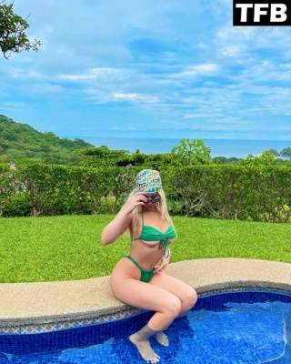 Tana Mongeau Poses in a Green Bikini on myfans.pics