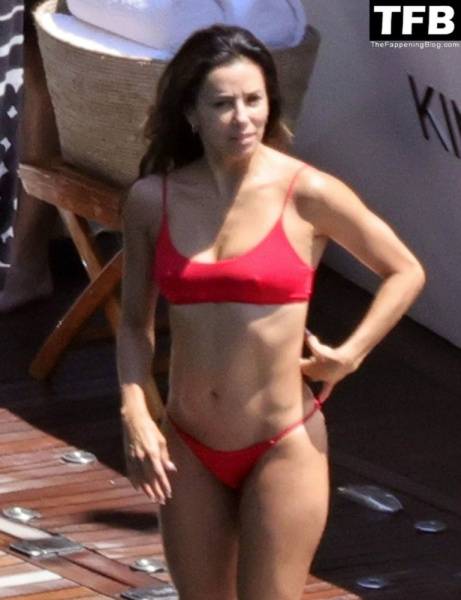 Eva Longoria Showcases Her Stunning Figure and Ass Crack in a Red Bikini on Holiday in Capri on myfans.pics