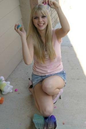 Sweet blonde teen Jana Jordan flashes upskirt panties while eating chocolate - Jordan on myfans.pics