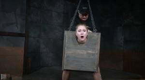 Blonde girl Odette Delacroix is made to suck a black cock with head in stocks on myfans.pics