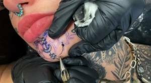 Tattoo enthusiast Amber Luke gets a new face tat from a female artist on myfans.pics
